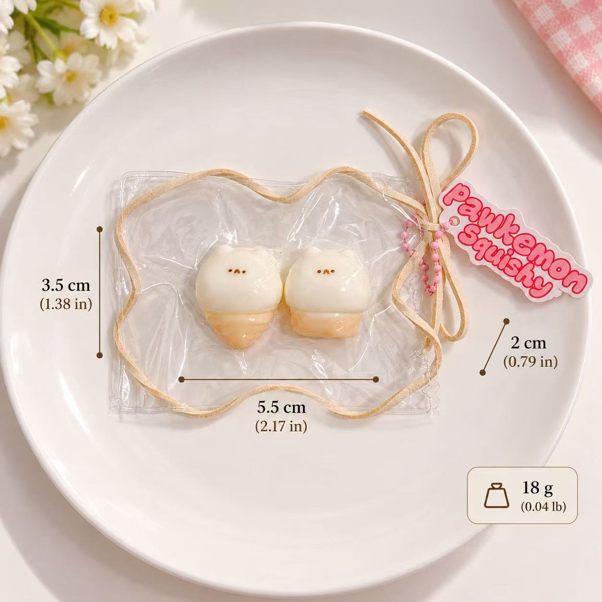 Two-piece mini hamster ice cream Taba squishy set in a clear PVC display bag with beige trim, photographed from above on a white plate.