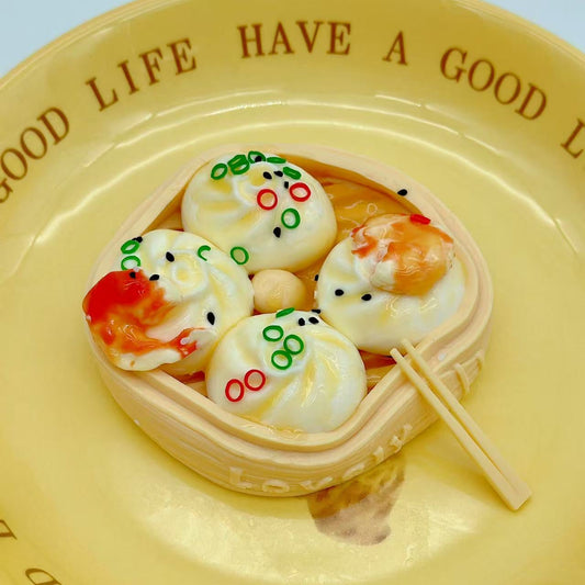 Dim sum shrimp squishy served on ceramic yellow plate, styled like gourmet food
