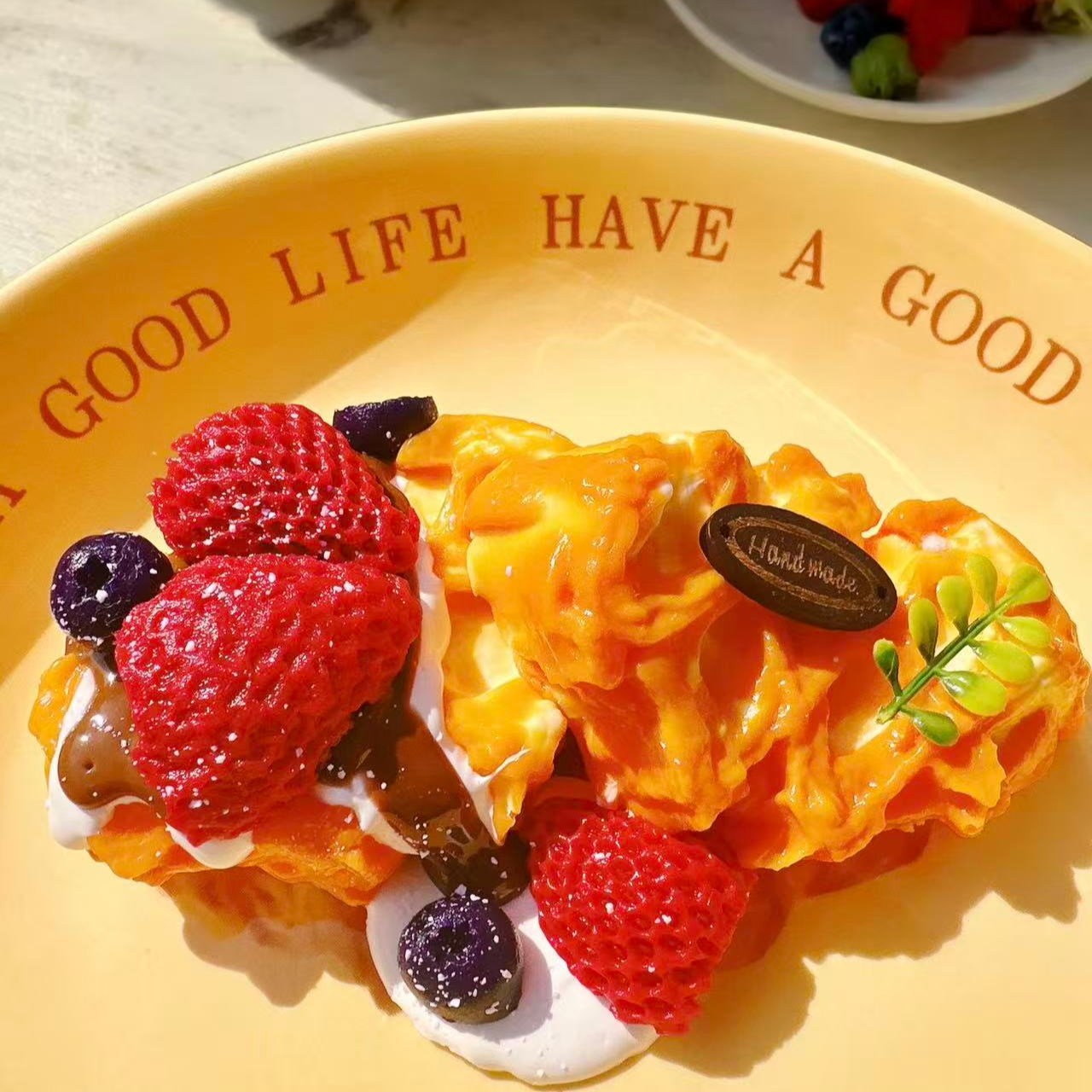 Handmade Berry Blossom Waffle Taba Squishy, realistic silicone dessert squishy featuring strawberries, blueberries and cream details, cute collectible stress toy for display and gifting