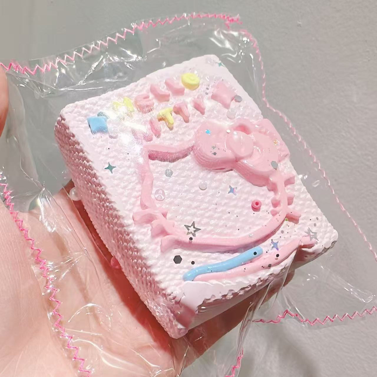 HK Magic Book Taba Squishy