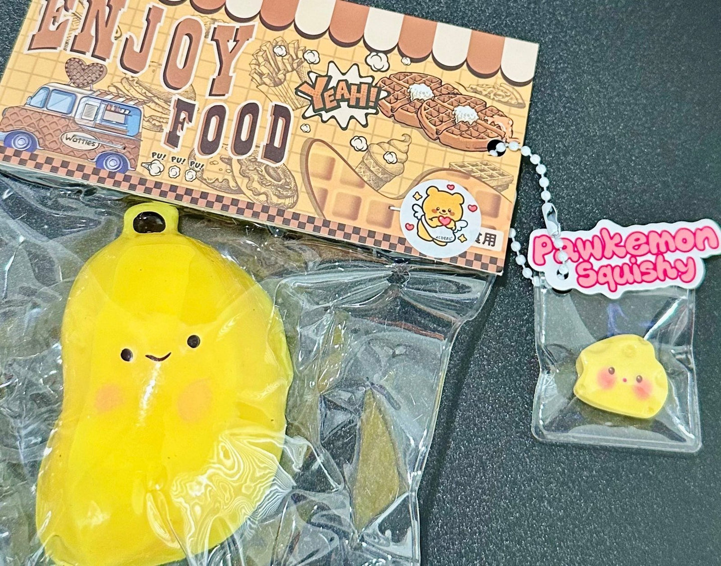 Kawaii banana squishy showcased with product packaging, showing cute design and gift-ready presentation