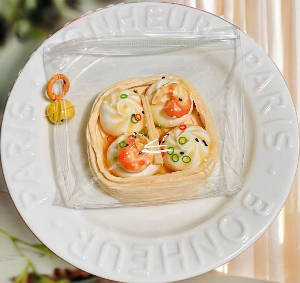 Dim sum shrimp squishy served on ceramic white plate, styled like gourmet food