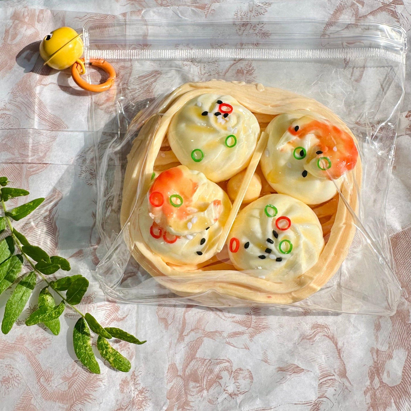 Petite shrimp squishy inside bakery-style transparent packaging with realistic print