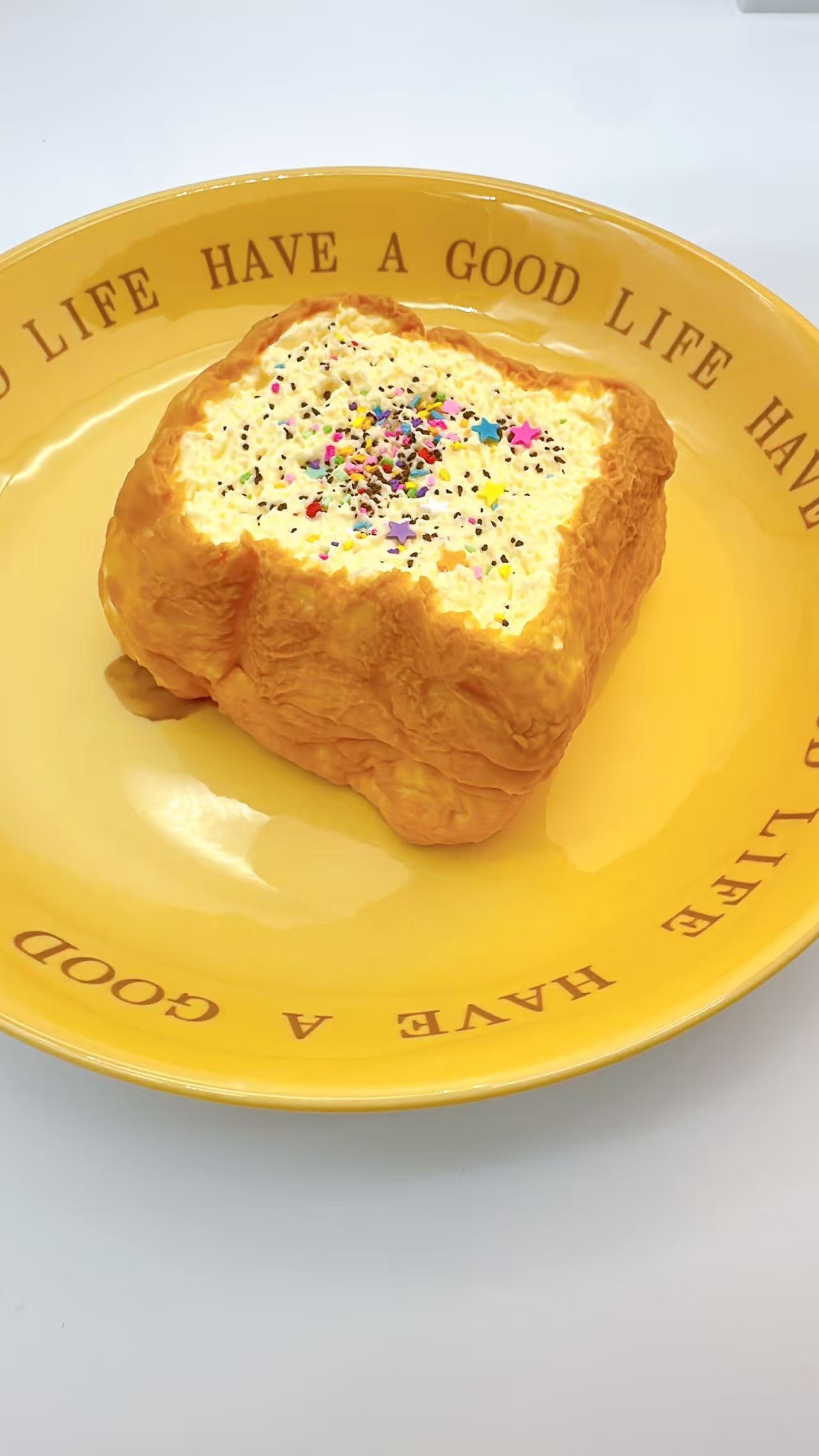 Side angle showing the two peel-apart layers of the Jumbo Toast Squishy.

