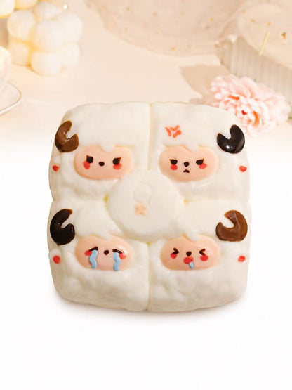 Handmade 4-in-1 Sheep Taba Squishy featuring four sheep faces on a soft white silicone design