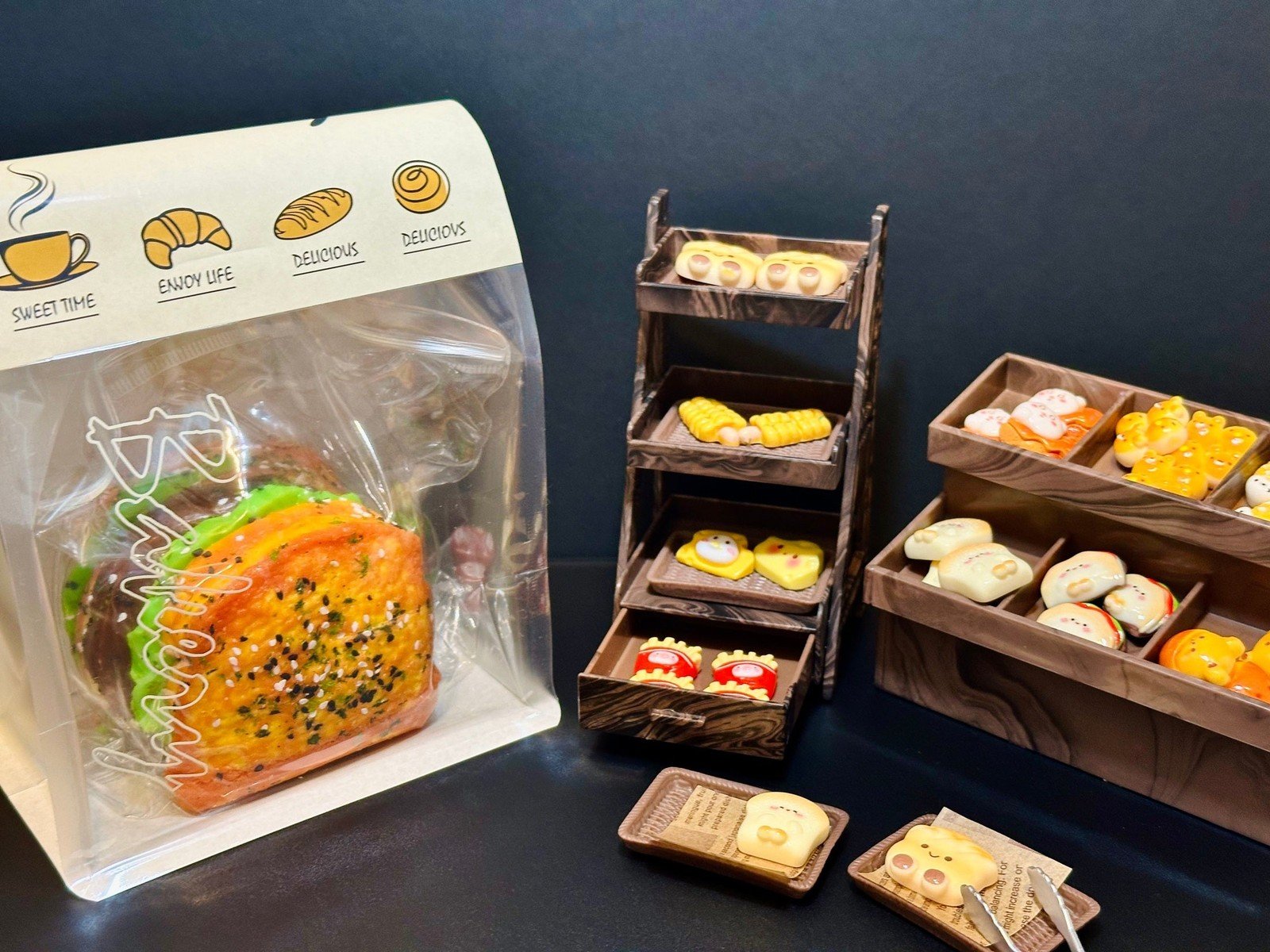 Front view of 6-layer jumbo sandwich squishy in transparent packaging with bread label