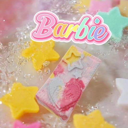 Barbie Denim Brick Taba Squishy – handmade pink brick squishy with Barbie heart design, soft slow rising kawaii stress relief toy surrounded by colorful star shapes