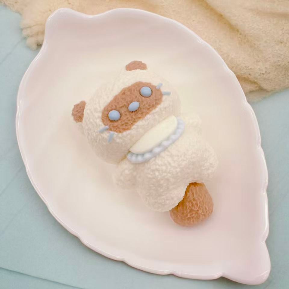 Adorable Siamese Cat Taba Squishy, realistic cream-colored cat design with blue details, soft stress relief toy perfect for kawaii squishy collection and decor.