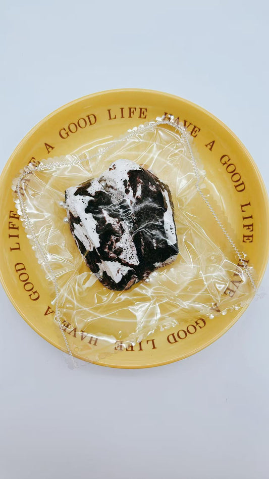 Front view of the Chocolate Toast Taba Squishy featuring marbled chocolate and cream swirls