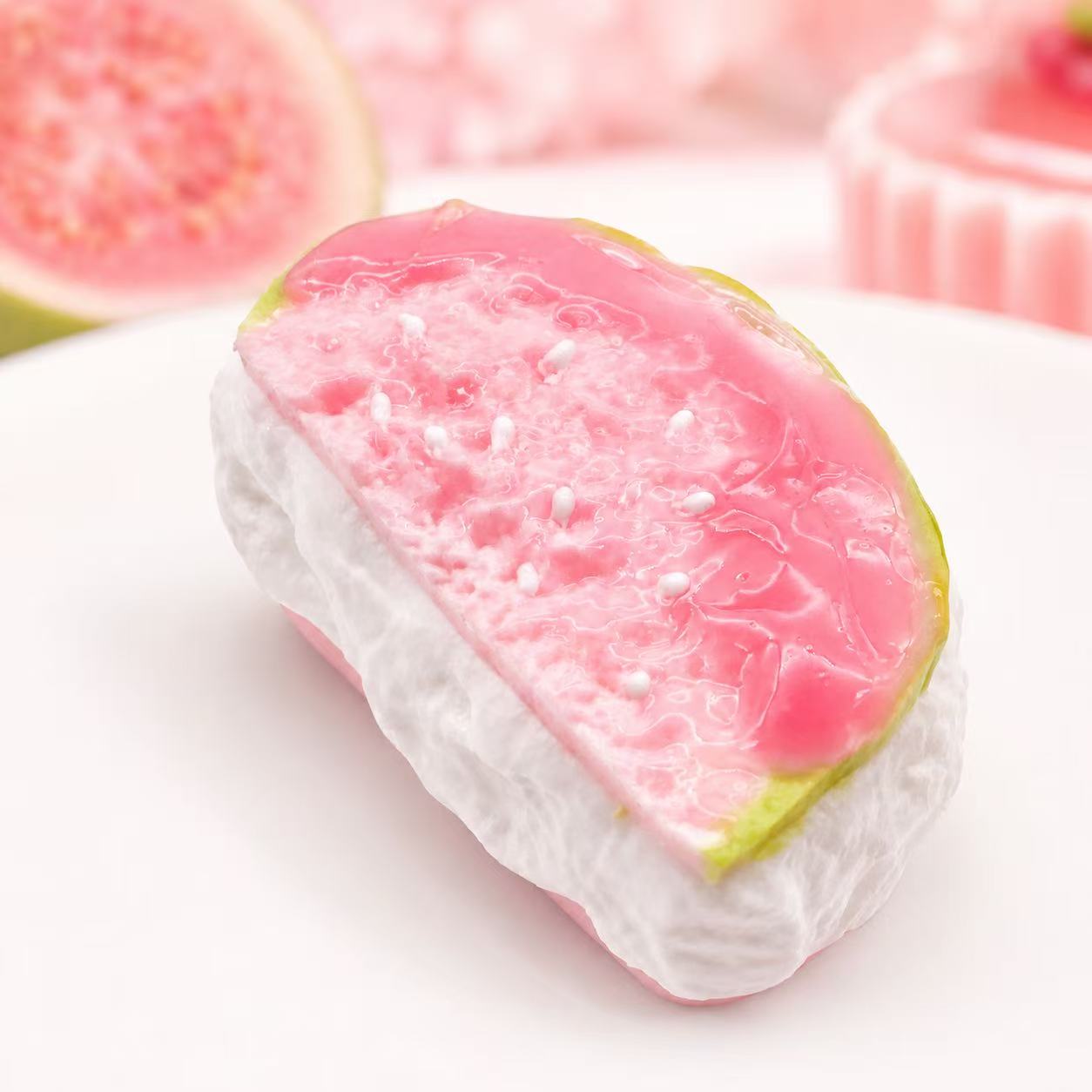Pawkemon Guava Soufflé Taba Squishy featuring a glossy pink guava slice, white cream texture, and handmade dessert-inspired design.