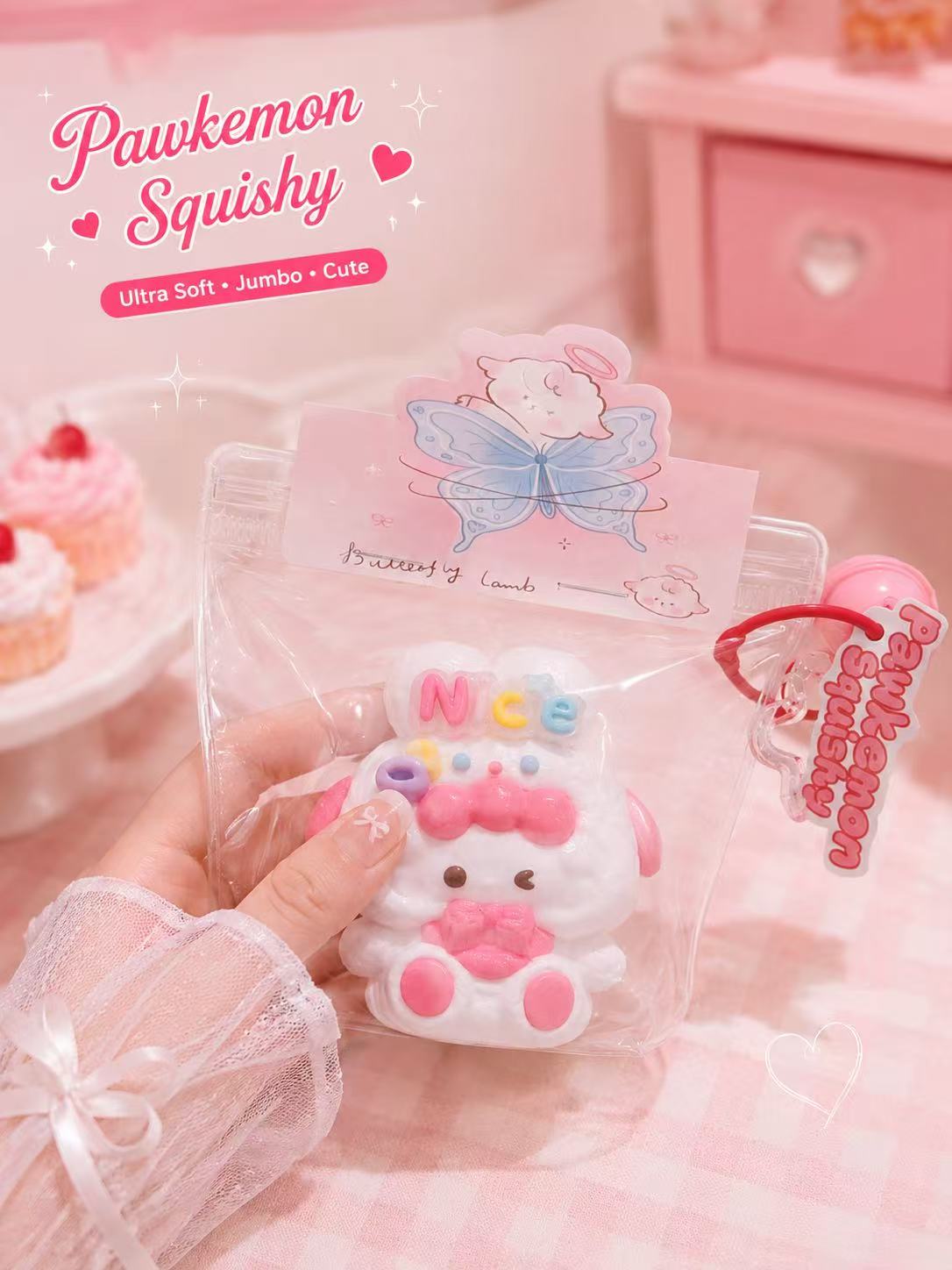 Pawkemon Pink Bunny Squishy toy in clear packaging held by a hand with a pink background