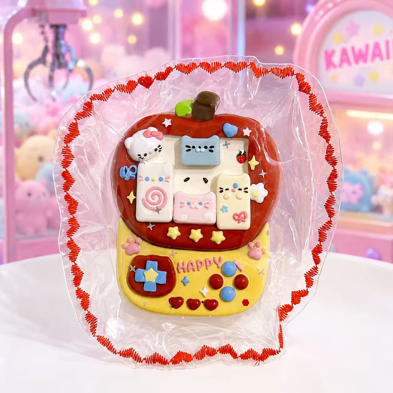 Handmade Arcade Machine Taba Squishy with colorful buttons, retro game details, and a decorative red border