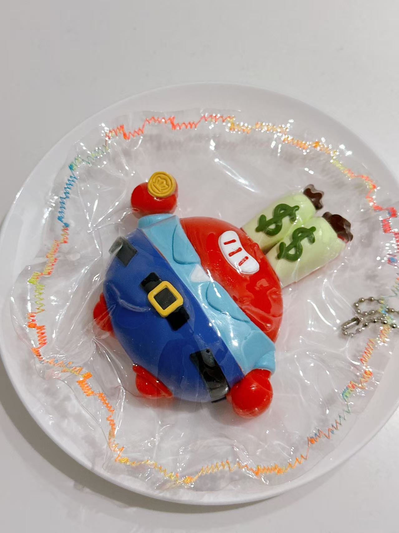 Right-side view of a handmade Cartoon Crab Taba Squishy showing its raised details, colorful accents, and soft silicone design