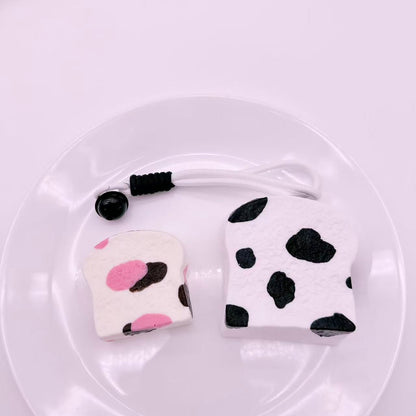 Thick Cow Toast and Pink Cow Toast Taba Squishy set – handmade slow rising squishies with black and pink cow print, cute stress relief toys for collectors