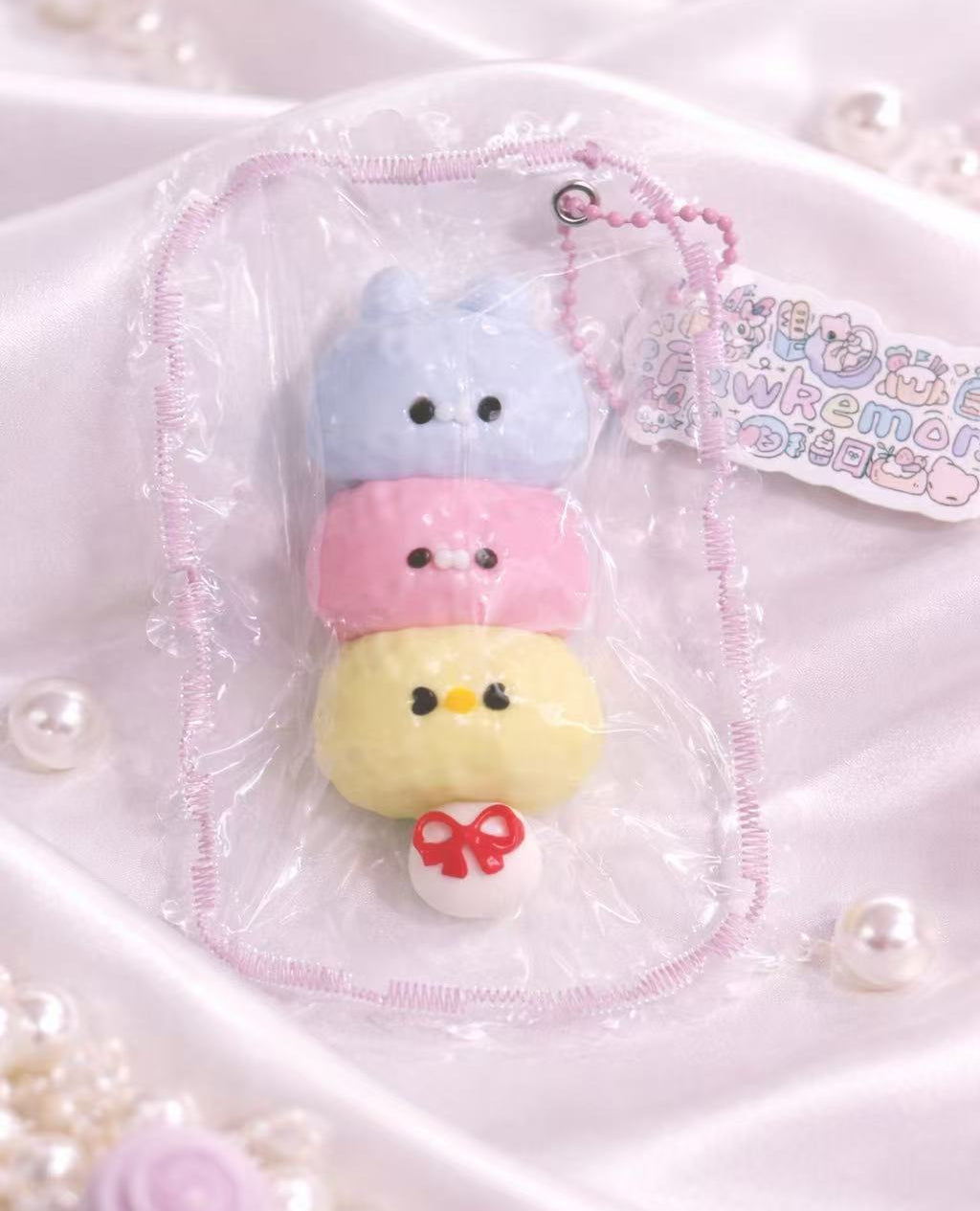 Cute Animal Stack Taba Squishy featuring three pastel animal characters stacked together, handmade silicone squishy in soft sewn gift packaging