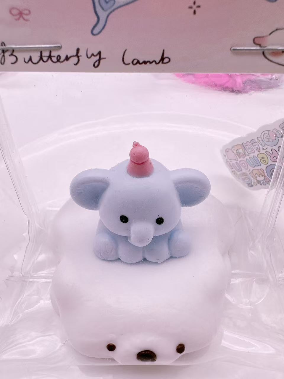 Elephant on Polar Bear taba squishy showing layered design with a blue baby elephant and fluffy polar bear, handmade silicone squishy toy with kawaii style