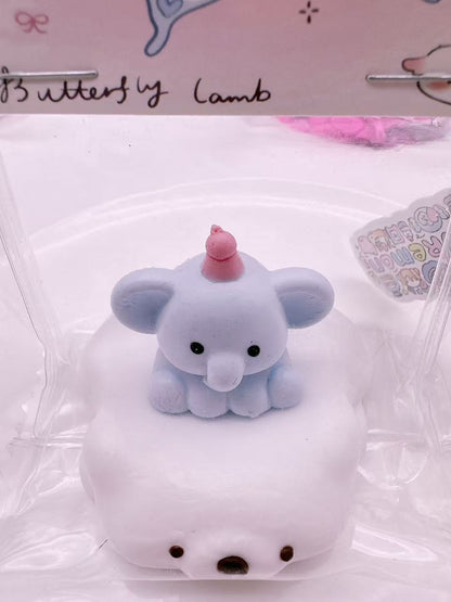 Elephant on Polar Bear taba squishy showing layered design with a blue baby elephant and fluffy polar bear, handmade silicone squishy toy with kawaii style