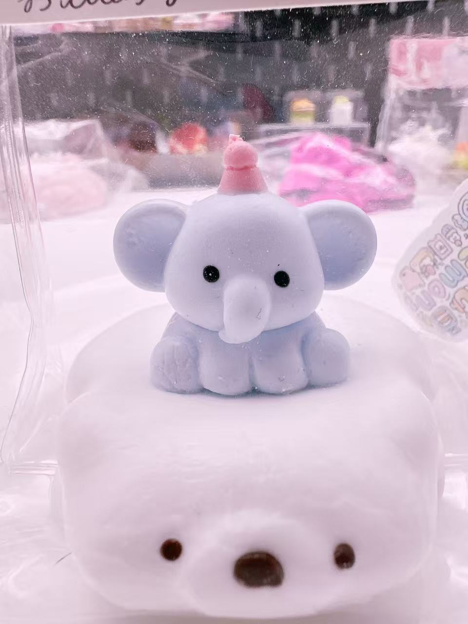 Close-up of Elephant on Polar Bear taba squishy highlighting soft silicone texture, cute animal faces, handmade sensory squishy toy