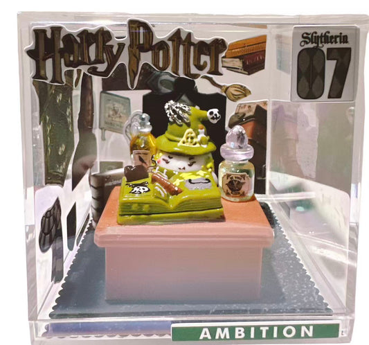 Evil Wizard Taba Squishy displayed in a clear acrylic box with dark magic alchemy desk scene, handmade silicone collectible squishy