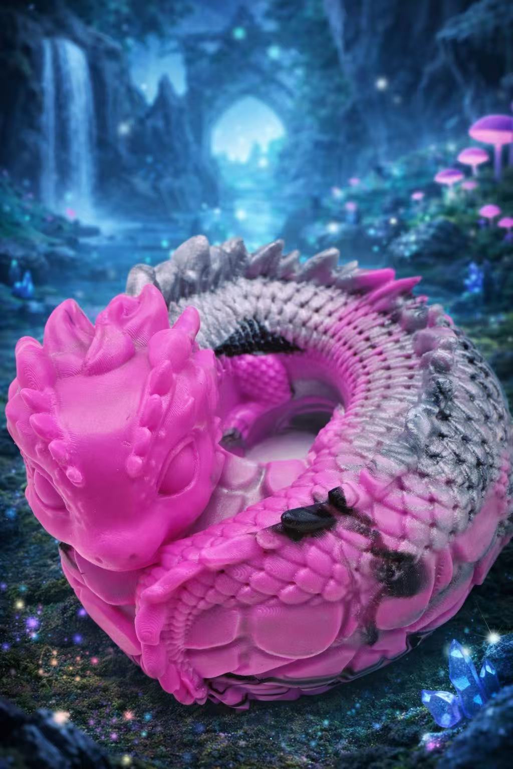 Pink fantasy dragon coil taba squishy displayed in a magical forest background, handmade silicone sensory squishy toy