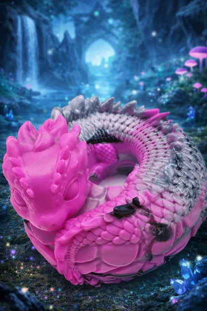 Pink fantasy dragon coil taba squishy displayed in a magical forest background, handmade silicone sensory squishy toy