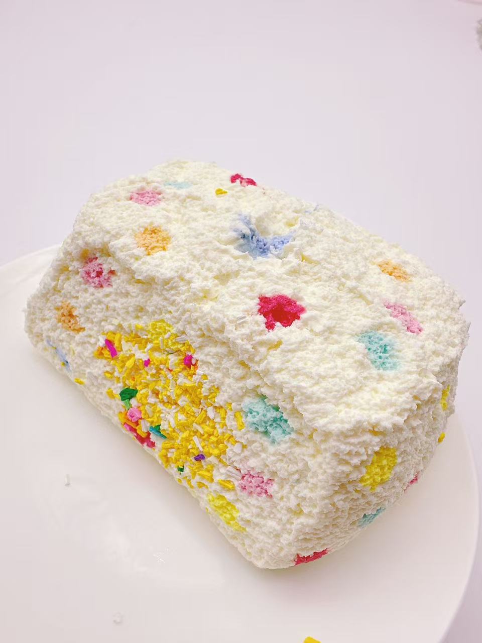 Back view of gummy bear toast taba squishy, handmade silicone squishy with textured surface and sprinkles, soft slow rising stress relief toy
