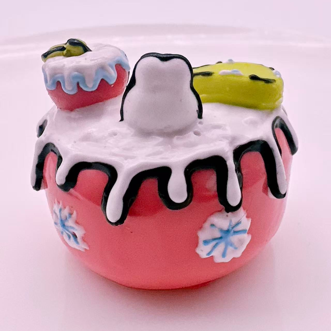 Full view of hand-painted bunny apple house taba squishy, cute anime inspired handmade silicone squishy collectible
