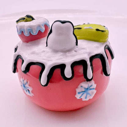 Full view of hand-painted bunny apple house taba squishy, cute anime inspired handmade silicone squishy collectible
