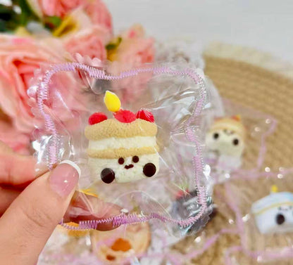 Birthday cake jellycat inspired squishy with cream details and kawaii face.
