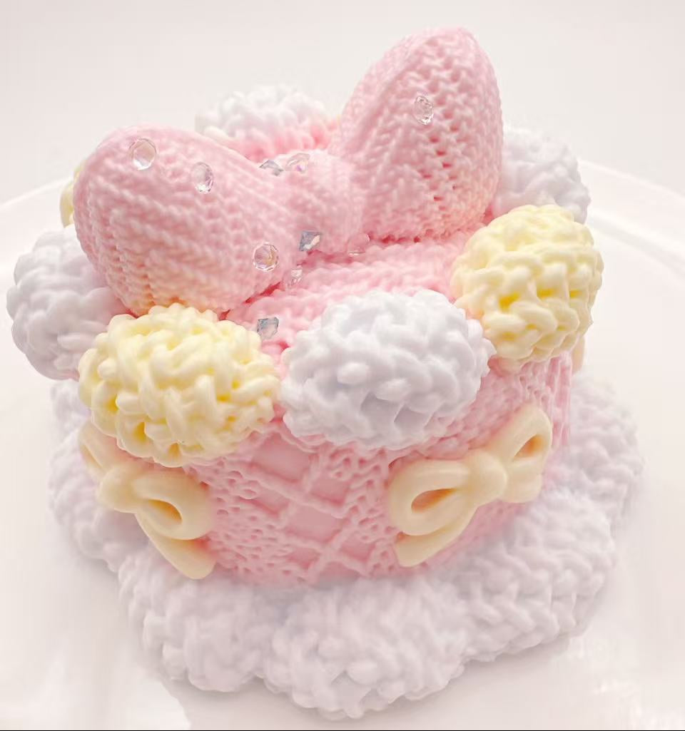 Handmade Knitted Bunny Bow Cake Taba Squishy featuring detailed knit-style cake design with bunny ears and creamy bow accents
