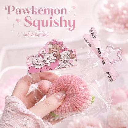 Hand holding the Knitted Peach Taba Squishy by Pawkemon Squishy, showing its soft handmade silicone texture, pink knitted-style peach design, clear packaging, and cute charm details.