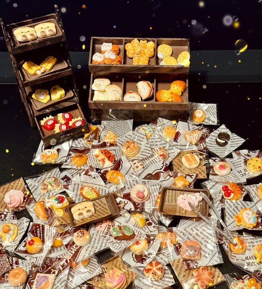 Miniature bakery blind bag with over 70 handmade resin toys, styled like tiny pastries, croissants, and buns
