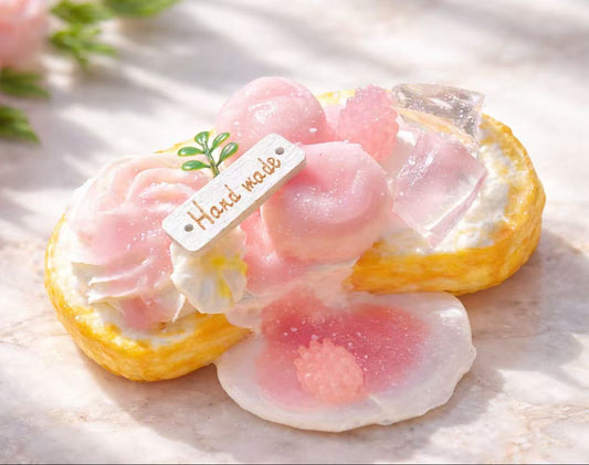 Peach Bloom Toast Taba Squishy, handmade silicone dessert squishy with peach jelly petals, creamy whipped texture and realistic toast base, collectible stress relief toy
