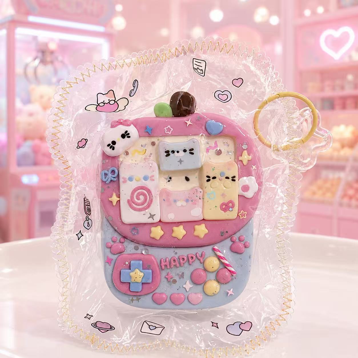 Handmade Pink Arcade Machine Taba Squishy with pastel buttons, retro game screen details, and colorful kawaii decorations