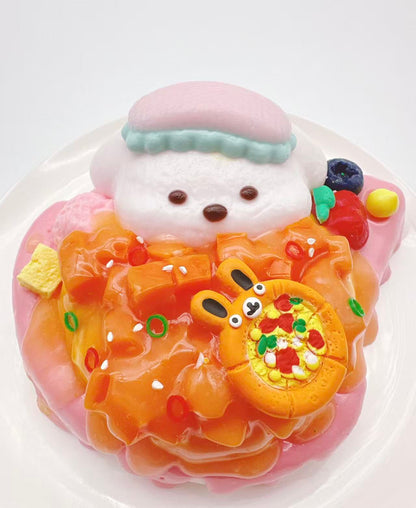 Angle view of puppy salmon toast taba squishy, handmade silicone squishy featuring salmon topping, fruit details and adorable puppy design