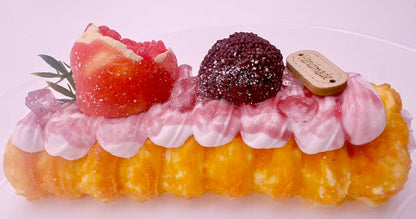 Ruby Crown Pastry Taba Squishy — hyper realistic handmade horn pastry squishy with waxberry, pomegranate, and whipped cream details.