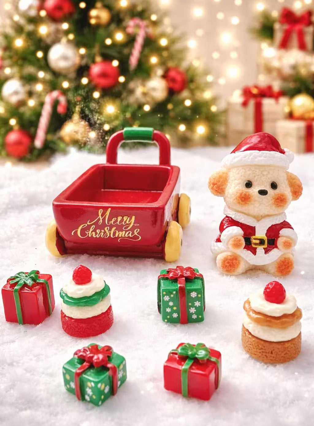 Santa Pup Gift Cart full set showing the Merry Christmas wagon, Santa puppy, gift boxes and mini cakes displayed on a snowy Christmas background