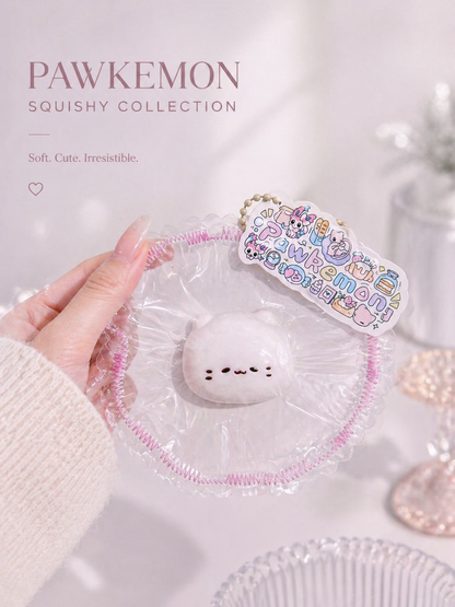 Handmade Sleepy Kitty Taba Squishy held in hand, showing its soft creamy texture and compact pocket-sized design