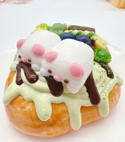 Two pigs dessert toast taba squishy with chocolate drizzle and dessert toppings, handmade silicone kawaii squishy inspired by bakery sweets
