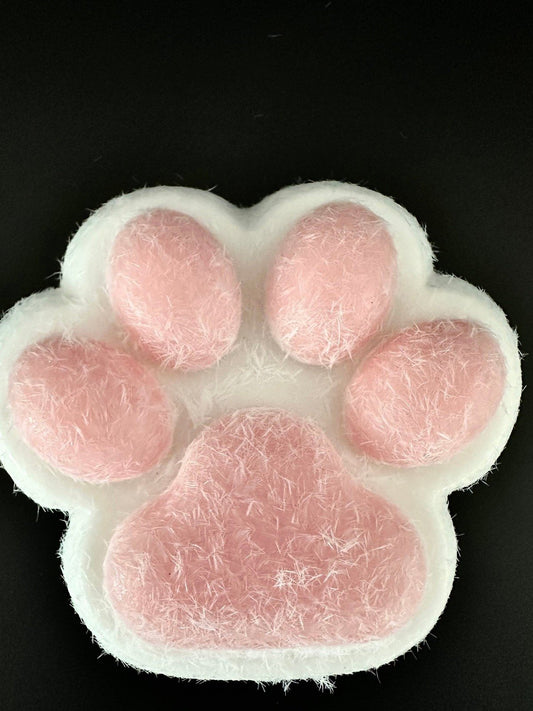 Front view of ultra soft cat paw squishy toy with pink paw pads and fuzzy plush texture, perfect for kawaii collectors and desk decor.